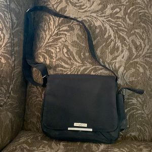 Donna Karan black adjustable strap magnetic close with zipper pockets